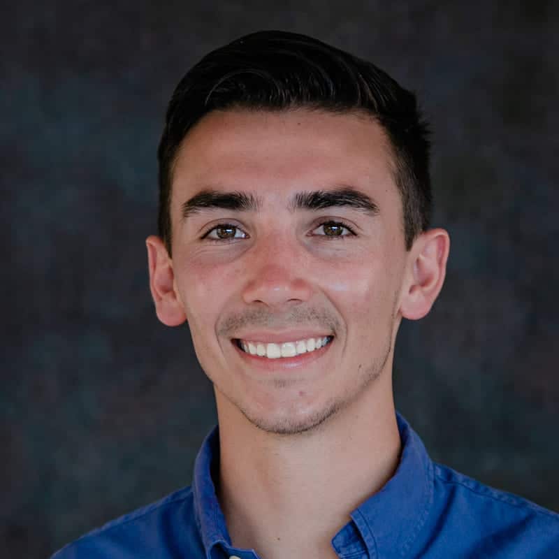 Dr. Zachary Vigil, dentist, in a blue shirt